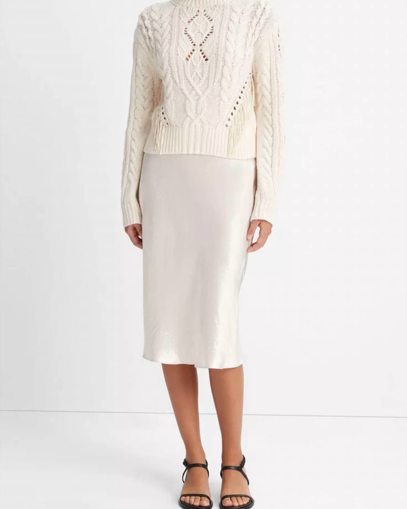 Front of a model wearing a size L Fringe Cable Sweater in Cream in Cream by Vince. | dia_product_style_image_id:364311